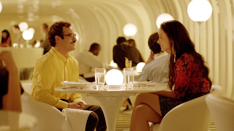 HER, l-r: Joaquin Phoenix, Olivia Wilde, 2013, Â©Warner Bros. Pictures/courtesy Everett Collection